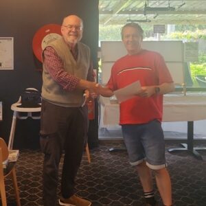 Ley Reynolds congratulating Ian Wrenford