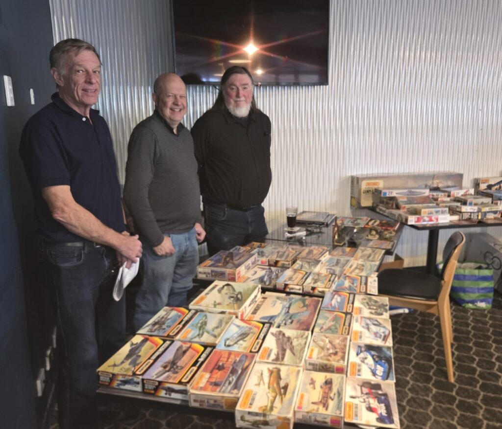 From left to right Nigel Patrick Bob Morgan and of Warren Evans with their prize Matchbox collection